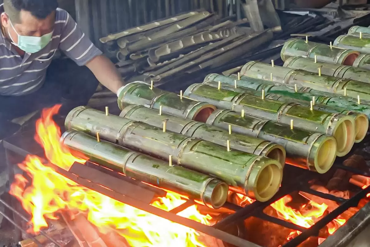 (ویدئو) غذای روستایی؛ پخت باورنکردنی برنج و گوشت در تنه بامبو به روش تایوانی