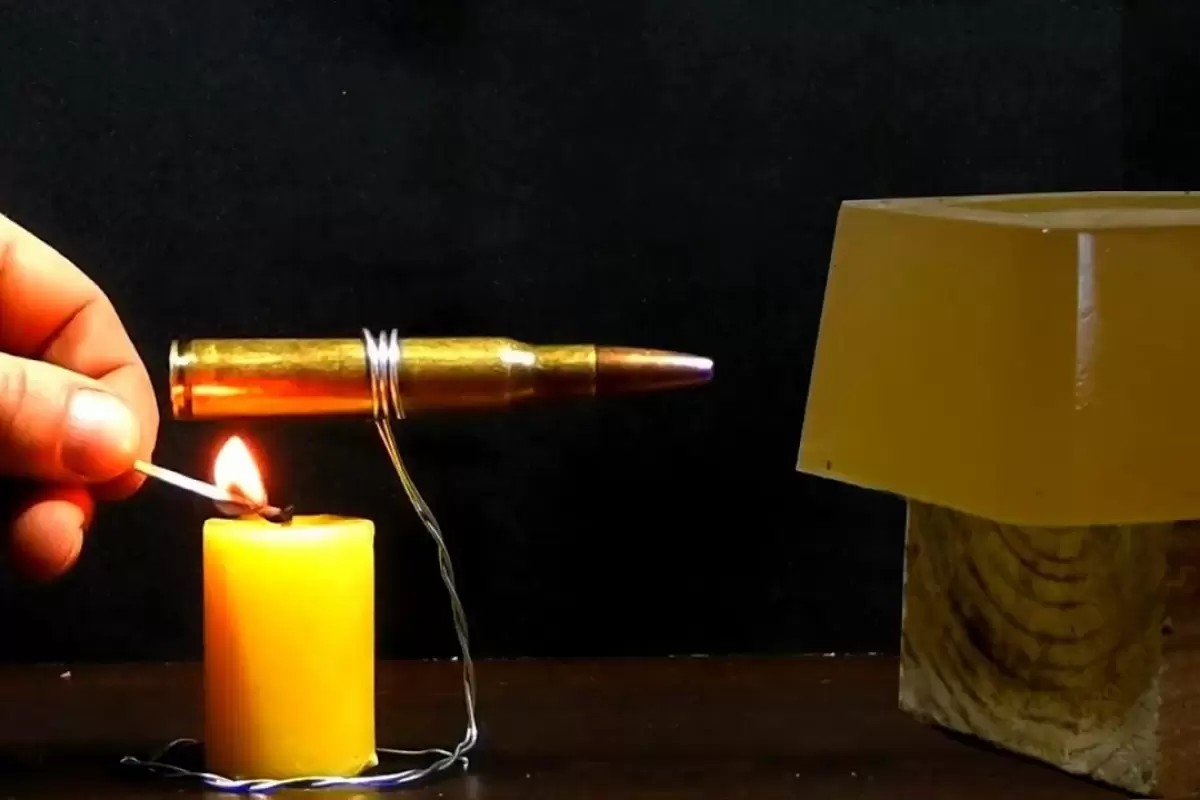(ویدئو) اگر شمع روشن را زیر گلوله جنگی قرار دهید، چه اتفاقی می افتد؟