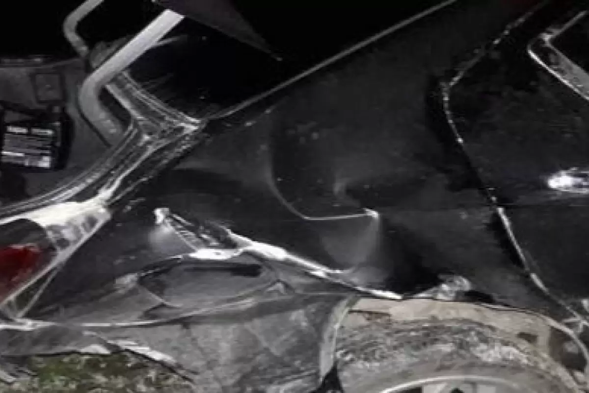 ببینید | تصادف خسارت‌بار BMW سری ۸ با خودروی دنا در حوالی جنت‌آباد تهران در شب
