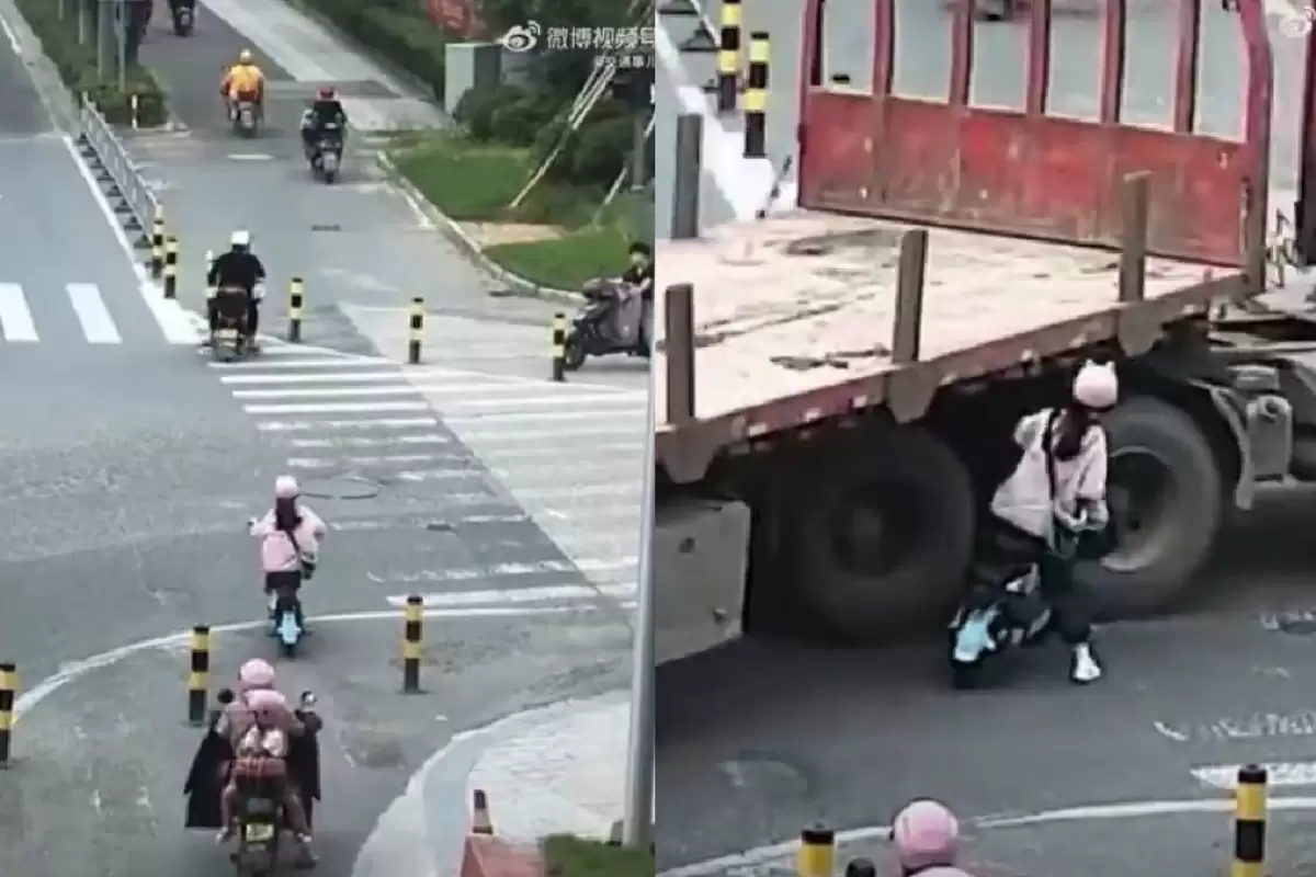 (ویدئو) زن موتورسوار زیر تریلی رفت و جان سالم به در برد