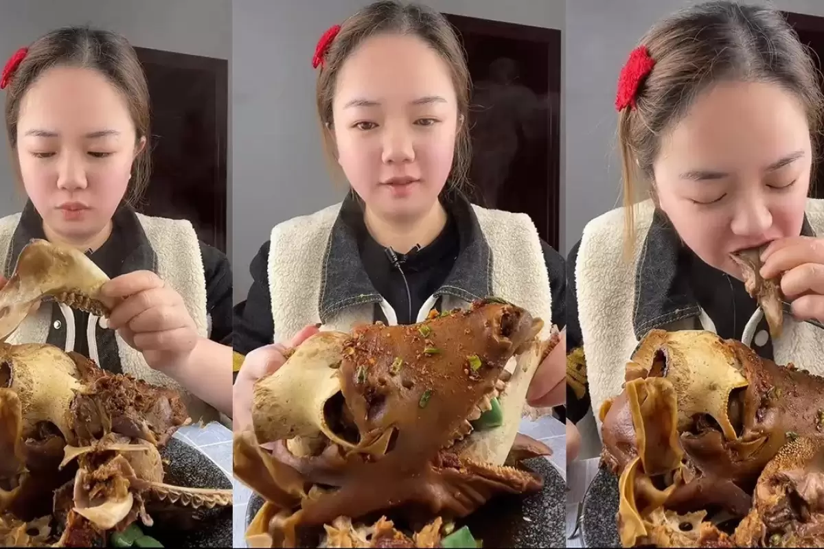 (ویدئو) غذا خوردن با صدا؛ خوردن کله پاچه بزرگ گوسفند توسط دختر جوان مشهور چینی