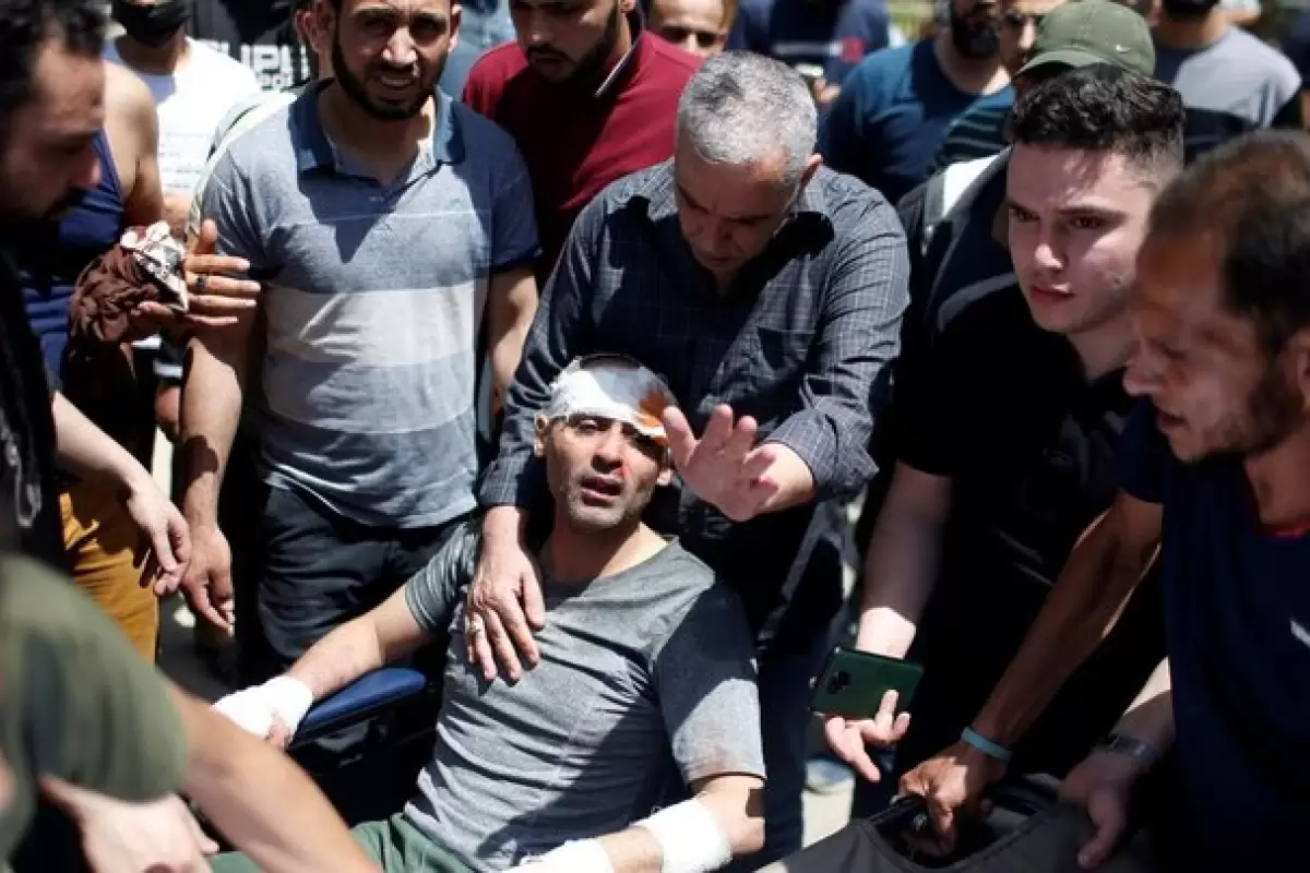 ببینید | حمله ناجوانمردانه نیروهای ارتش اسرائیل به یک جوان فلسطینی مبتلا به سندروم داون