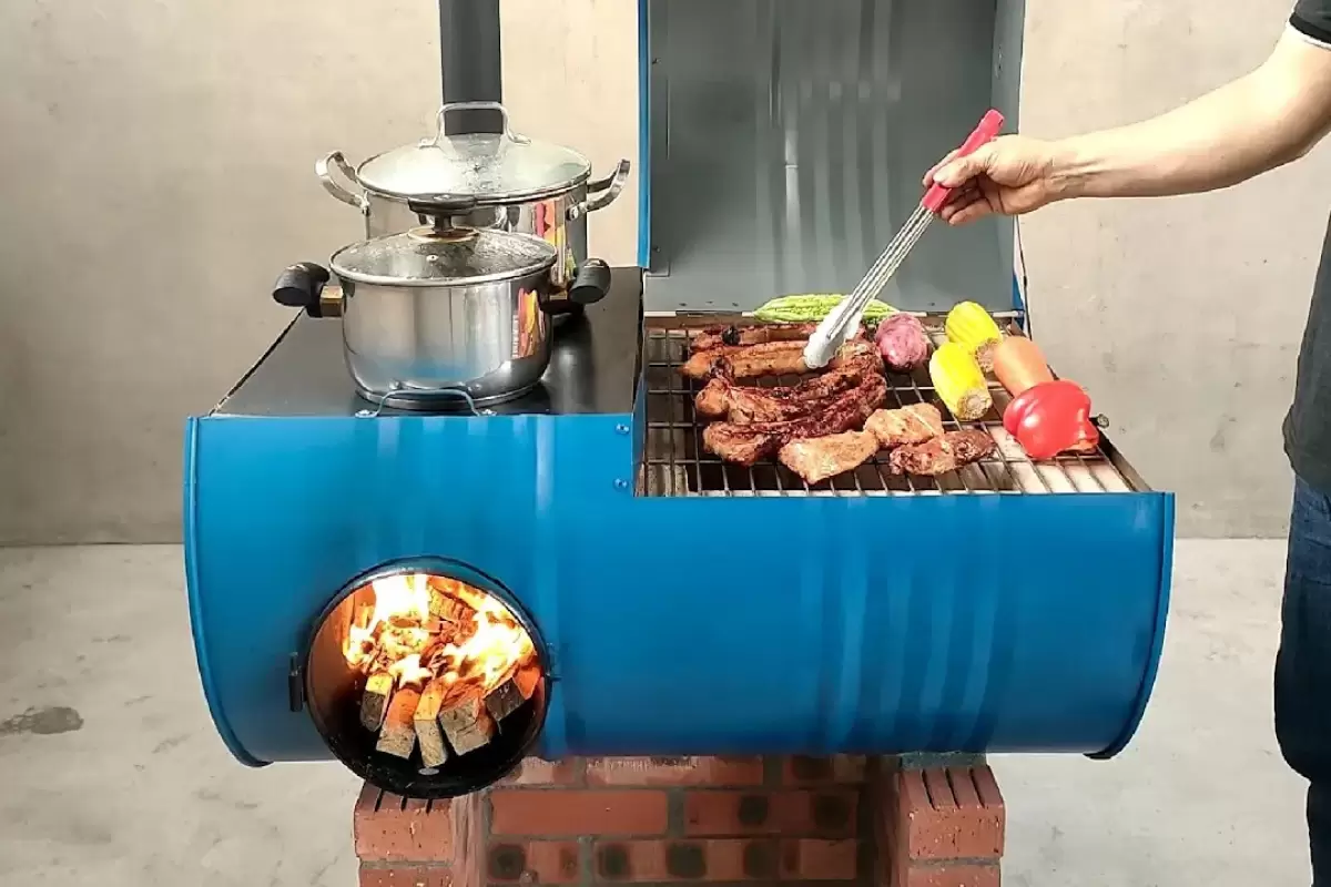 (ویدئو) نحوه ساخت خلاقانه کباب پز و اجاق هیزمی با بشکه آهنی