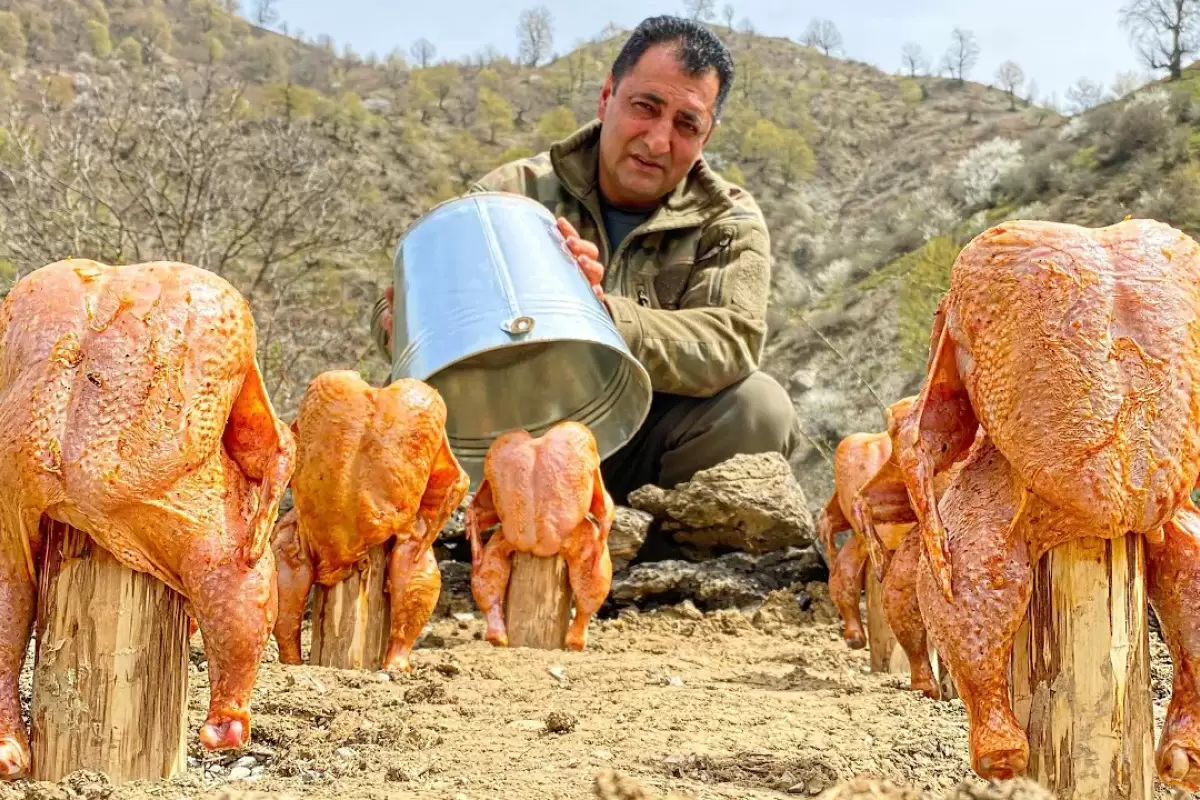 (ویدئو) روش خلاقانه آشپز مشهور آذربایجانی در کباب کردن 6 مرغ زیر سطل فلزی