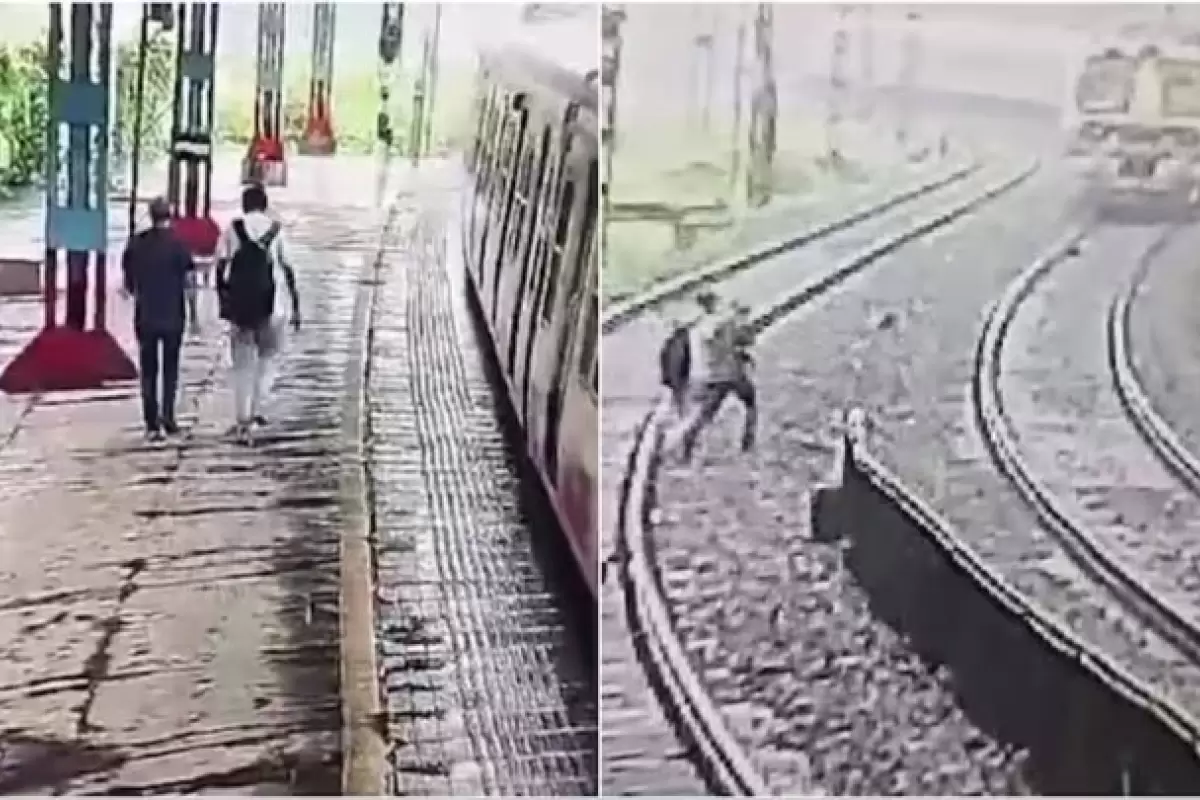 ببینید | لحظه بسیار دلخراش خودکشی پدر و پسر هندی روی ریل قطار / حاوی تصاویر ناراحت‌کننده