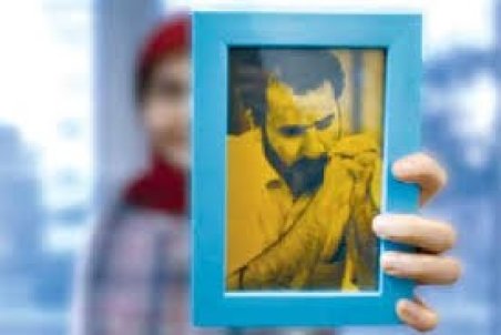 ماجرای آن عکس روی دیوار مجمع