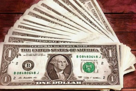 کرمانشاه| حذف "دلار" از معاملات بین‌المللی تصمیمی عجولانه است