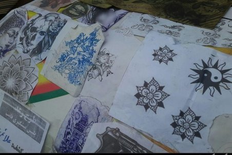 کشف کارگاه‌های تتوزنی با علائم شیطان‌پرستی + تصاویر