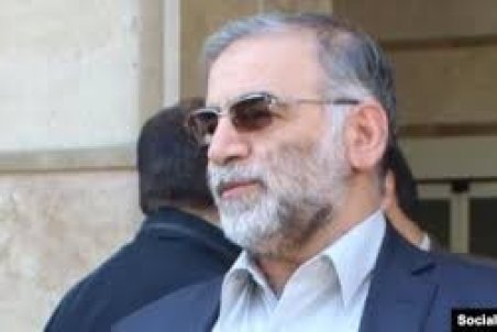 لحظه تشییع پیکر شهید فخری‌زاده در حرم رضوی